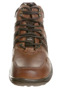 Brown leather hiking shoe with black laces, padded collar, reinforced toe, and textured sole. Design features contrasting stitching details.