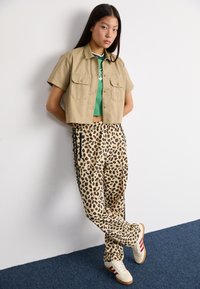 adidas Originals LEOPARD - Treniņtērpa apakšdaļas - black