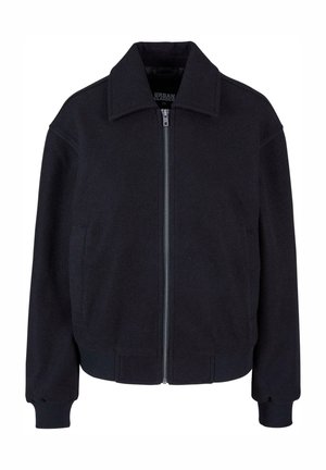 Schwarze Zip-Jacke mit Kragen, langen Ärmeln und gerippten Bündchen. Hergestellt aus strukturiertem Stoff mit seitlichen Taschen.