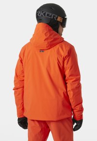Helly Hansen ALPINE INSULATED - Lyžařská bunda - cherry tomato