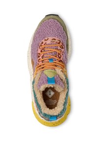 Multicolored sneaker featuring a plush purple upper, leopard print accents, orange laces, and a textured yellow sole with speckled detailing.
