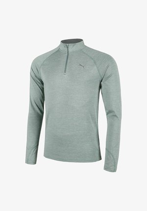 Lichtgroene lange mouw atletische pullover met een kwart rits, raglanmouwen en een reflecterend Puma-logo op de borst. Glad, gemêleerd materiaal.