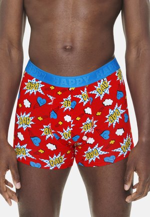 Red boxer shorts featuring a graphic pattern of blue hearts, clouds, and comic-style "DAD" in yellow, with a blue elastic waistband labeled "HAPPY."