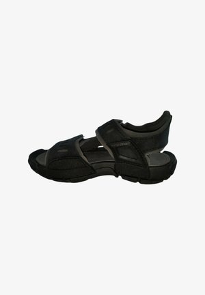 Sandalo nero con punta aperta, cinturini regolabili in velcro e suola spessa progettata per il comfort e l'utilizzo all'aperto.