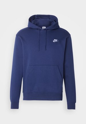 Tumed sinine kapuutsiga sule, mis on valmistatud pehmest kangast. Esiosa on tasku, kapuuts jõu tõmbejõu ning rinnal on väike valge Nike logo.