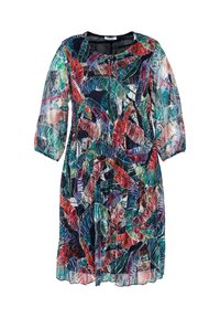 Polven pituinen mekko, jossa on 3/4 läpinäkyvät hihat, monivärinen trooppinen lehtikuvio punaisena, vihreänä, sinisenä, purppurana ja valkoisena mustalla taustalla.
