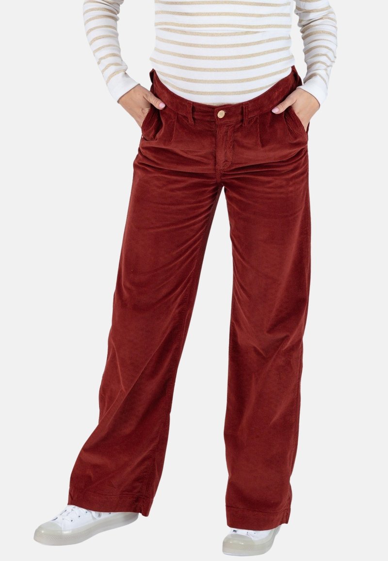Corduroy wijde broek in roestkleur, met voorzakken, een knoopdetail bij de taille en een gestructureerde ribbelstof.