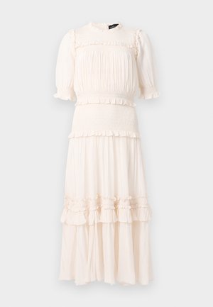 Cream midi dress with puff sleeves, smocked waist and bodice, and ruffled tiered skirt details against a plain background.