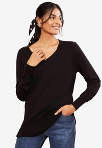 - Sweter