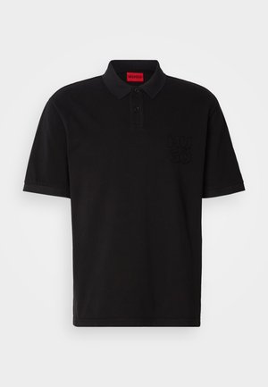 Black polo shirt made of cotton, featuring a collared neckline, two buttons, and a tonal "HUGO" logo on the left chest area.