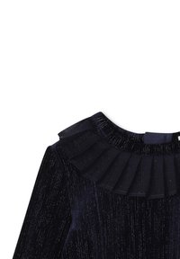 Haut en velours bleu marine avec un col plissé et une subtile brillance. Les manches longues et la texture douce rehaussent son design élégant.