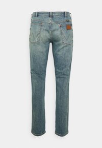 Wrangler LARSTON - Calças de ganga justas - grid indigo