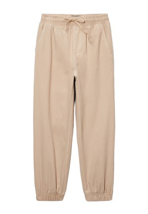 Pantalon décontracté beige avec taille élastique et cordon de serrage, poches latérales et ourlets élastiques aux chevilles.