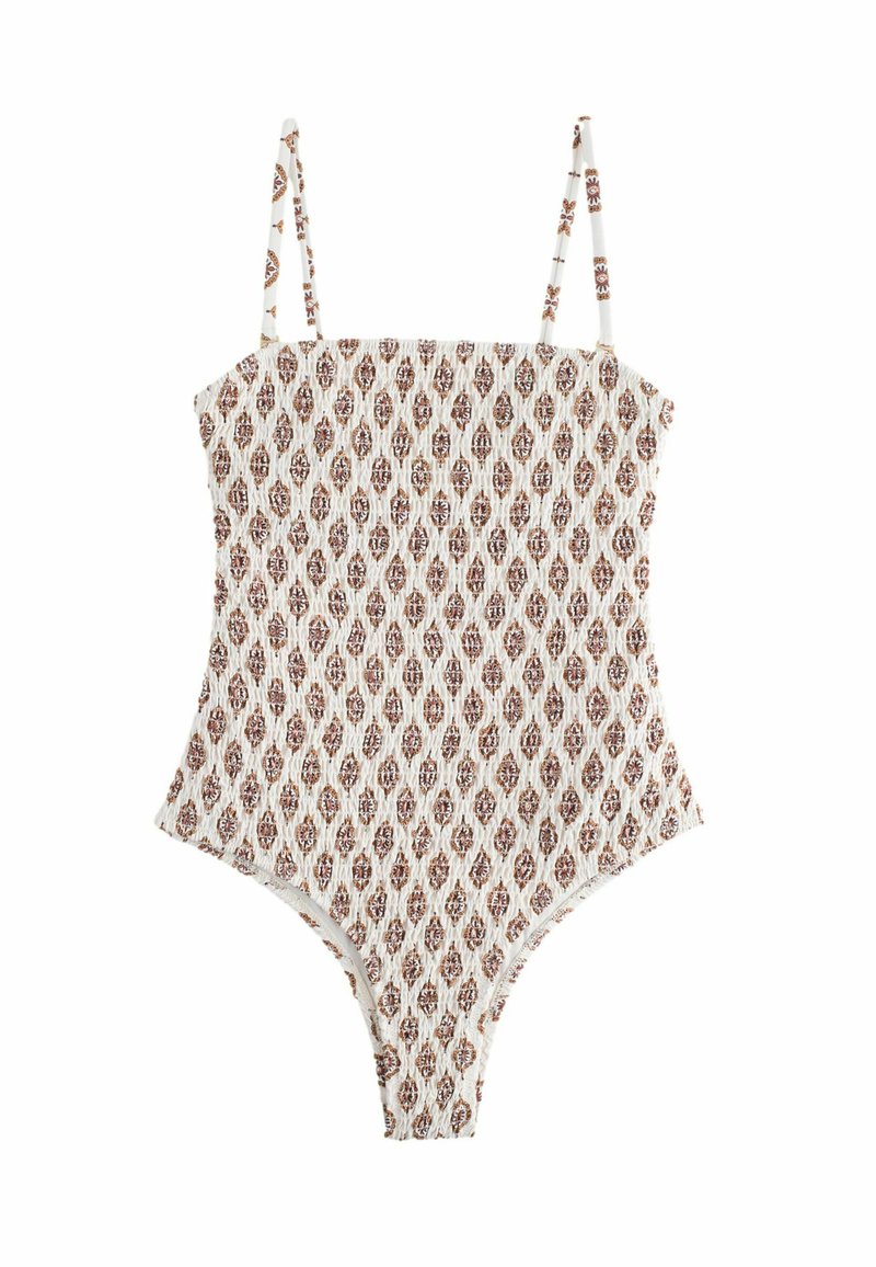 Costum de baie dintr-o singură piesă cu bretele subțiri și ajustabile, material crem cu un model paisley maroniu, siluetă ajustată cu decupaje înalte la picioare.