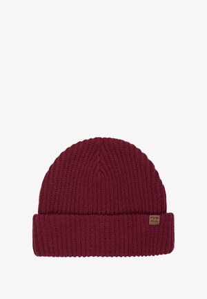 Burgundy knit beanie with ribbed texture and turned-up cuff. Features a small tan logo tag on the side. Soft and warm material.