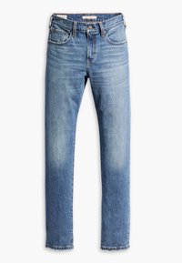 Jeans de color azul claro hechos de denim, con un diseño de pierna recta, cinco bolsillos, acentos desgastados y un dobladillo con un borde sin acabar.