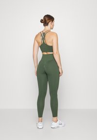 ICANIWILL DEFINE SEAMLESS SCRUNCH - Leggings - autumn green