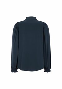 Blouse bleu foncé avec un col, des manches longues bouffantes et des poignets élastiques. Tissu lisse avec une coupe ample et un ourlet arrondi. Vue de dos montrée.