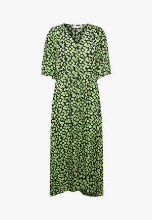 Black dress with a v-neck, short sleeves, and a tie waist. Features a green polka dot pattern and a flowing silhouette. Lightweight fabric.