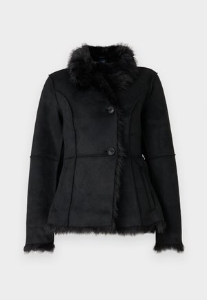 Veste en faux suède noire avec un col et des poignets en fausse fourrure doux, dotée de deux boutons, d'un design ajusté et de poches latérales.
