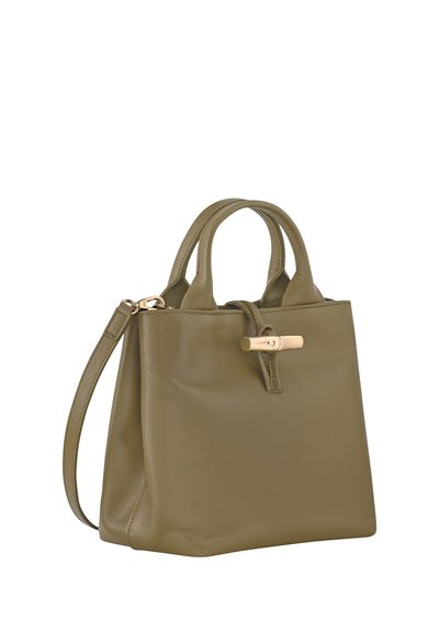 Olive green leather handbag with two top handles, a detachable shoulder strap, and a gold-tone fastening detail on the front.