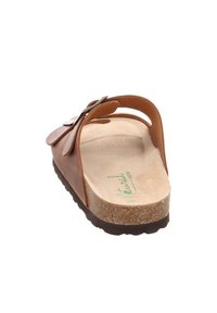 Braune Leder-Slipper-Sandale mit Korksohle, die dekorative florale Akzente und ein weiches beiges Fußbett aufweist. Leicht und ergonomisch gestaltet.