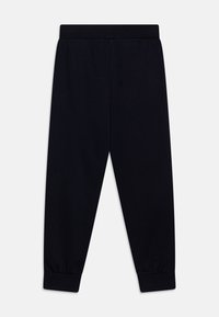 Svart, myk stoff joggebukser med elastisk midje og mansjetter, med en rett ben-design og uten tilleggsmønstre eller detaljer.