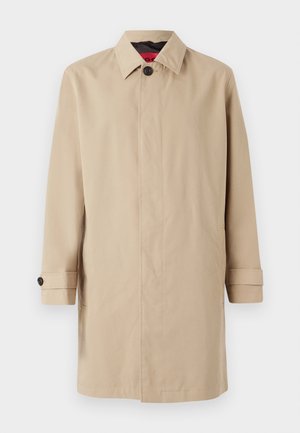 Beige trench coat with a straight cut, featuring a button closure, collar, and side pockets. Made of smooth, lightweight fabric.