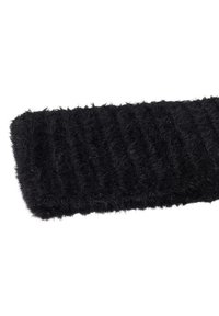 Tira de tela negra texturizada con superficie suave y difusa con patrón acanalado. Los bordes son rectos y el material parece mullido.