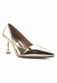 Gold patent leather high heel pump with a pointed toe and thin geometric-shaped heel. Interior features a brown insole with branding.
