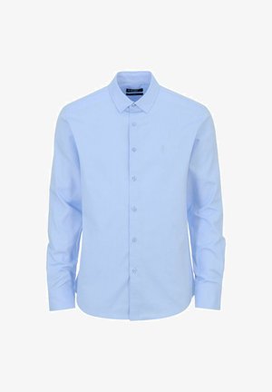 Jasnoniebieska, długotaliowana koszula na guziki z gładkiego materiału. Posiada klasyczny kołnierzyk oraz zapięcie na guziki z małym logo.