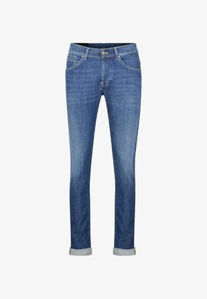 Denim jeans in medium blue, featuring a fitted design, five pockets, and classic cuffed hems. Smooth texture, minimal fading details.