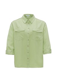 Chemise vert clair boutonnée avec col, deux poches poitrine à rabats et manches longues retroussées.