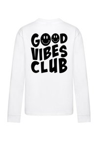 Valge pika varrukaga T-särk, mille seljal on julgelt must tekst "GOOD VIBES CLUB" koos kahe naeratava näoga. Pehme kangas.