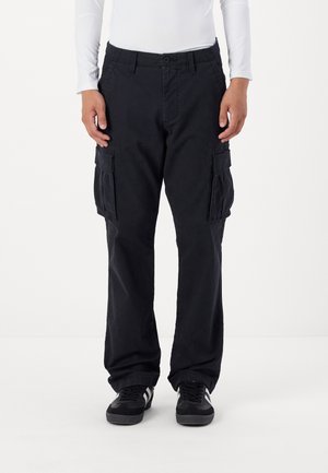 Black cargo pants with side pockets, made of durable fabric. Features a straight-leg design and a waistband with a button closure.