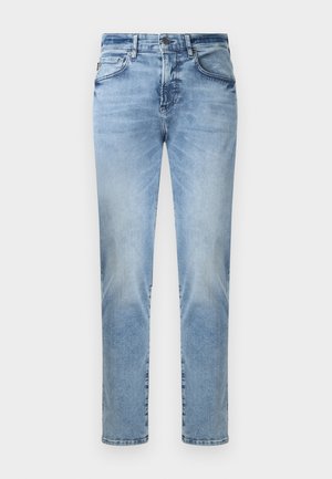 Lyseblå denimjeans med straight-leg design, som har frontlommer, glidelås og synlige sømdetaljer.