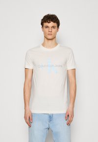 Calvin Klein Jeans SEASONAL MONOLOGO TEE - Marškinėliai su spaudiniu - ivory