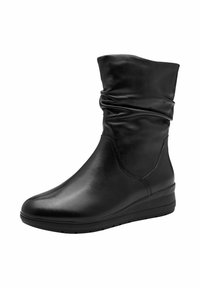 Schwarze Leder-Stiefelette mit schlampigem Design, runder Zehenpartie und niedrigem Keilabsatz. Glatte Textur mit dezenten Nähdetails.