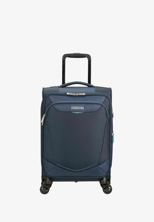Valise American Tourister bleu marine avec quatre roues pivotantes, poignée télescopique, poignée de transport supérieure et poche avant zippée.