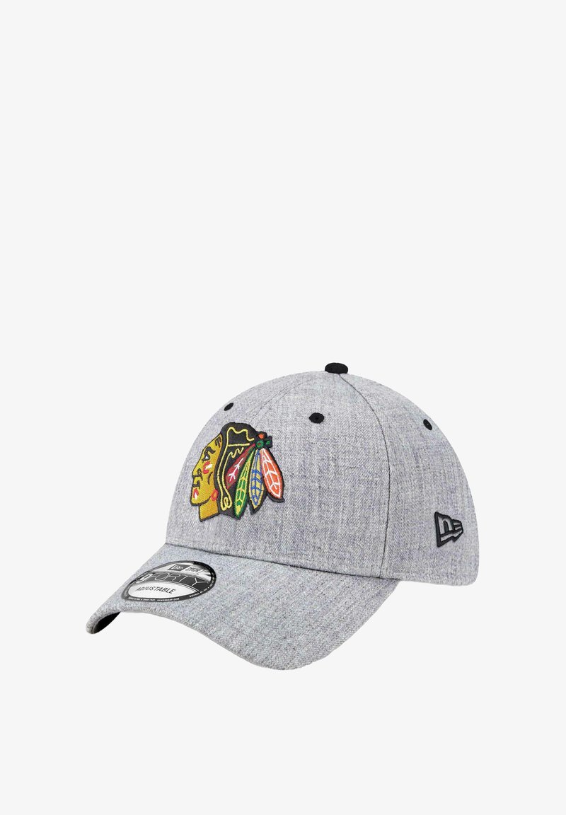 Gray fabric baseball cap featuring an embroidered Chicago Blackhawks logo in yellow, red, green, and black. Adjustable strap at the back.