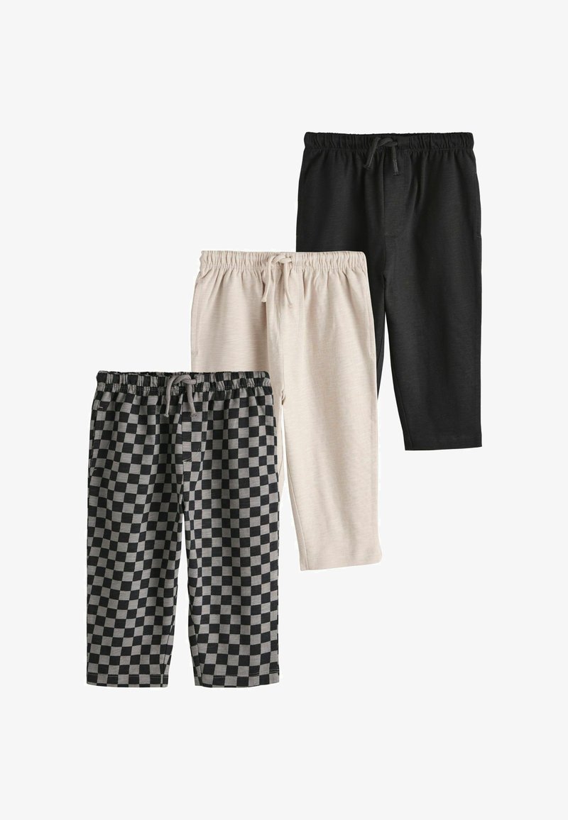 Trois pantalons pour enfants : un noir, un beige et un à motif damier noir et gris. Tissu doux avec ceintures élastiques.
