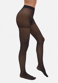 Pantys negros transparentes con un patrón geométrico texturizado en las piernas, que presentan una cinturilla lisa y sólida. Su diseño ajustado acentúa las piernas.