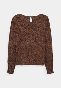 Brun långärmad blus med blå blommönster, en nyckelhålöppning bak och en avslappnad passform. Mjuk tyg med en slät textur.