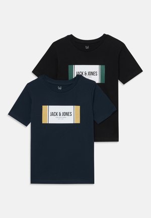 Two short-sleeve t-shirts: one black with a white and green logo, one navy blue with a white and yellow logo. Cotton fabric, round neck.