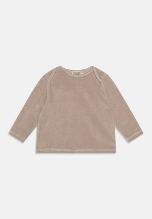 Langärmliges Shirt aus weichem beigem Samt, mit rundem Ausschnitt und genähten Akzenten entlang der Kanten. Schlichtes, kastenförmiges Design.