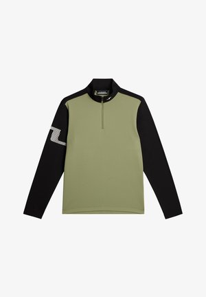 Długi rękaw, koszulka z rozpięciem na ćwierć z materiału w kolorze oliwkowym i czarnym, z teksturowanej tkaniny, kontrastującymi rękawami i dyskretnym logo na ramieniu.
