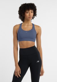 New Balance Reggiseno sportivo con sostegno medio - blue purple blue
