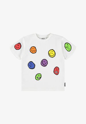 Bijela pamučna majica s različitim šarenim otiscima smajlića u crvenoj, narančastoj, žutoj, zelenoj, plavoj i ljubičastoj boji. Kratki rukavi, klasičan kroj.
