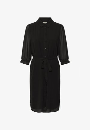 Svart klänning med krage, knäppning fram och trekvartslånga genomskinliga ärmar. Inkluderar en figurnära midjebälte och mjuk tygtextur.