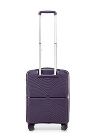 Hardshell suitcase in purple with a textured wave pattern, extending handle, and four wheels for easy maneuverability.